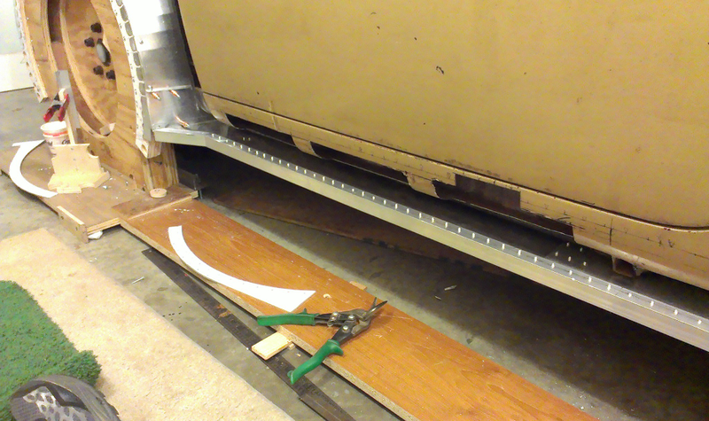 Fitting the rocker panel edge.